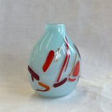 small vase with expressive strokes of colour pattern