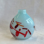 small vase with expressive strokes of colour pattern