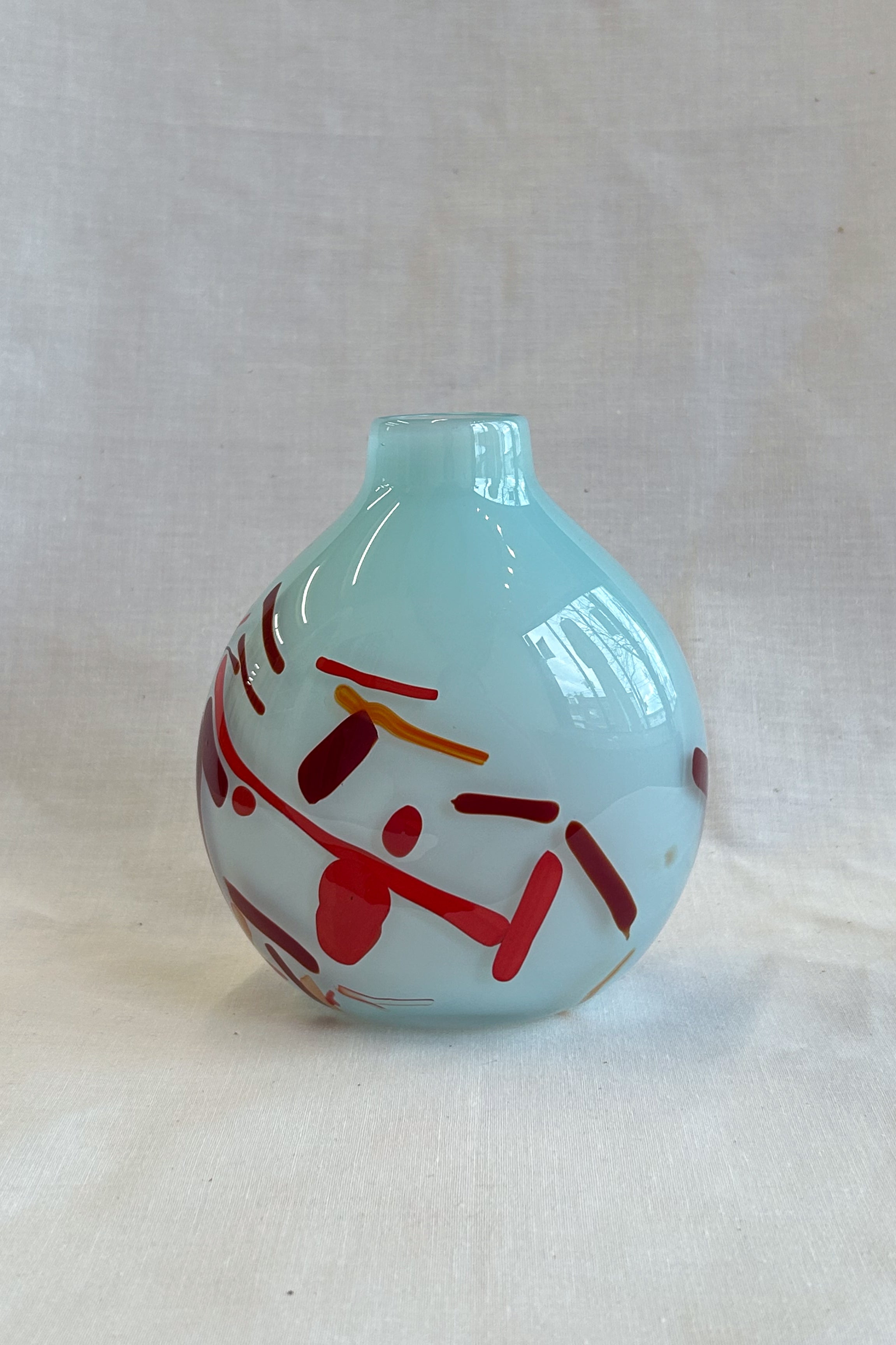 small vase with expressive strokes of colour pattern
