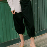 ROMAIN CAPRIS IN BLACK
