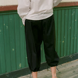 ROMAIN CAPRIS IN BLACK