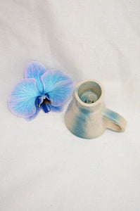 handmade ceramic mug in white and blue glaze