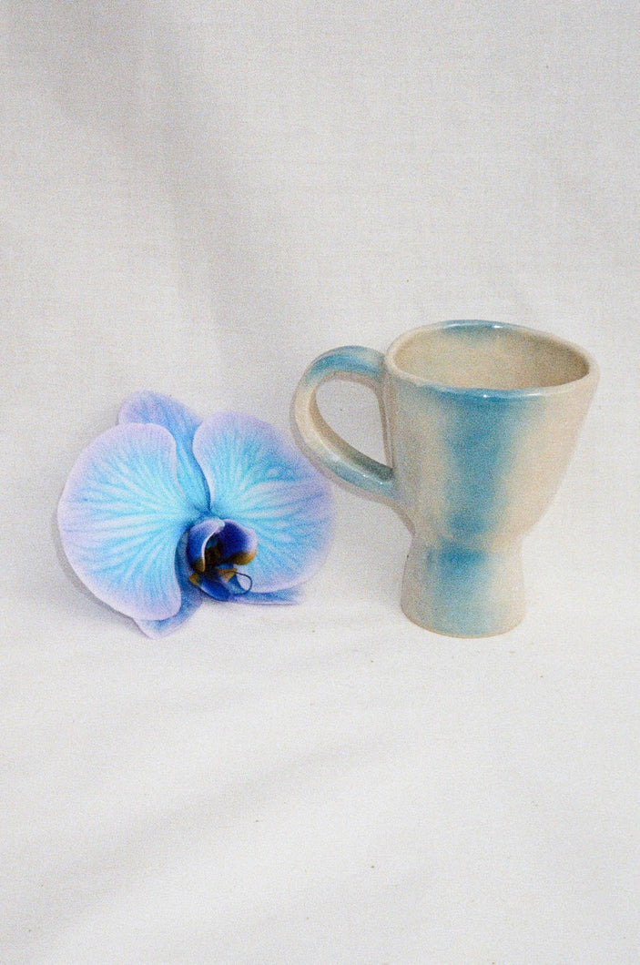 handmade ceramic mug in white and blue glaze