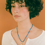 gold plated silver snake necklace blue silk cord