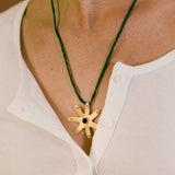 gold plated silver flower necklace green silk cord