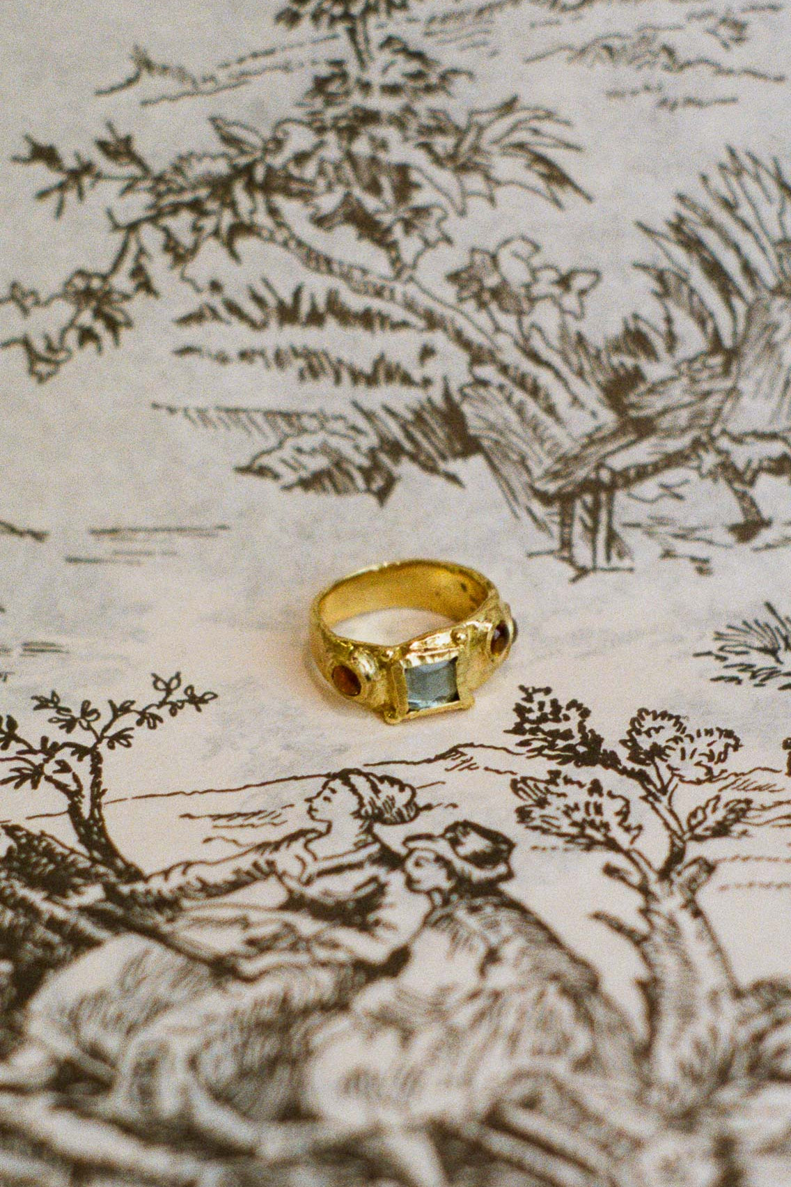 textured brass band ring with glass cabochons