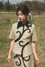 Load image into Gallery viewer, beige cotton button up top with black spirals