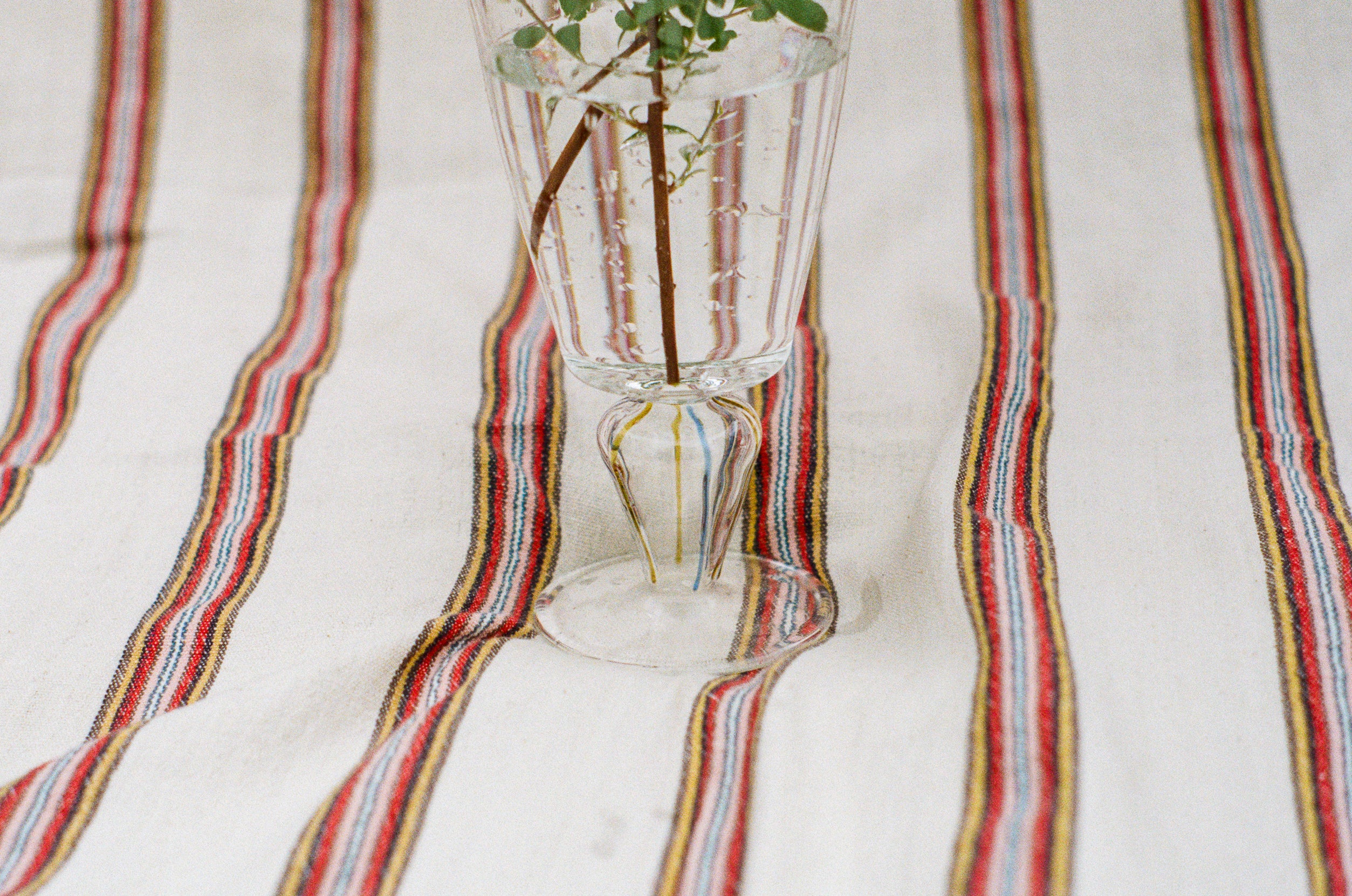 clear glass trumpet vase blue yellow details