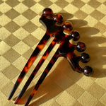 recycled cellulose acetate tortoise shell thin crown comb 