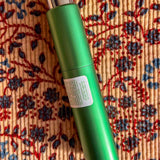 green bottled bathing body mist purifier