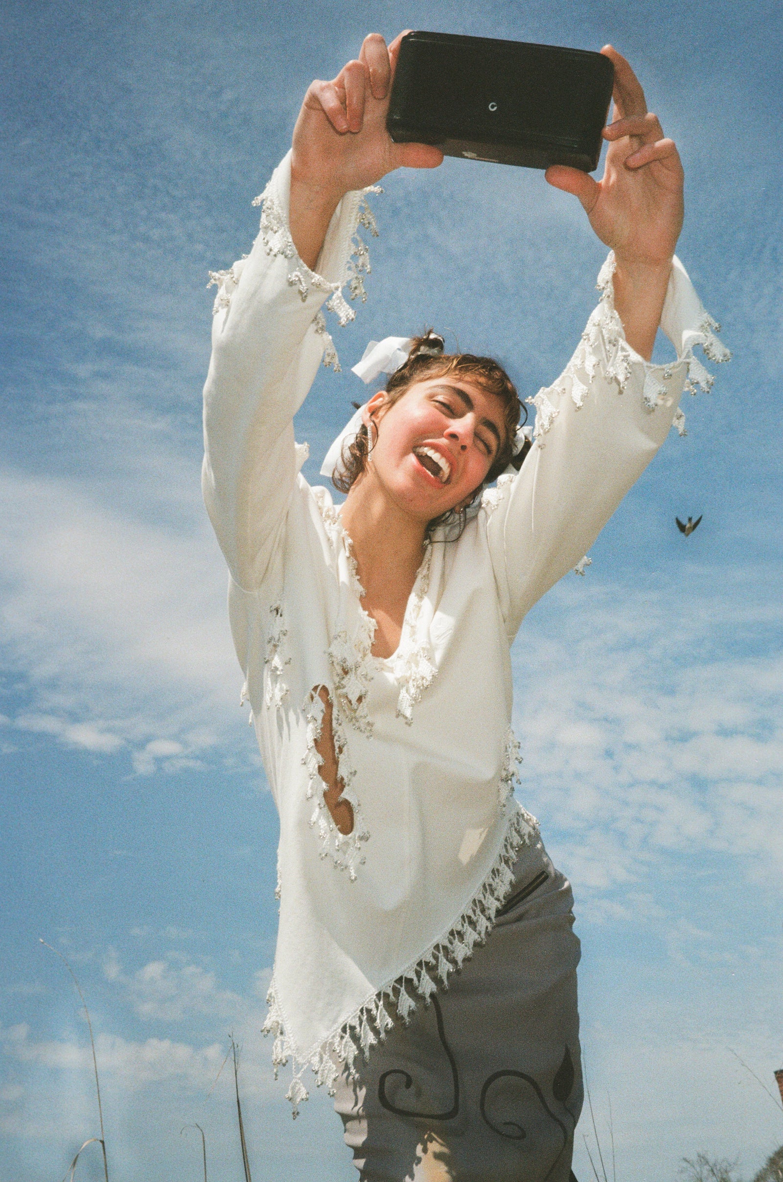 SWEATSHIRT WITH BEADED COLLAR AND HOLES IN WHITE