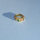 textured brass band ring with coloured glass stones
