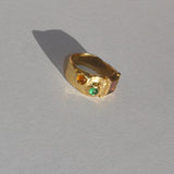 textured brass band ring with coloured glass stones