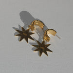 brass demi hoop earrings with dangling star