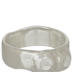 silver textured band ring with clear glass stones