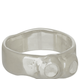silver textured band ring with clear glass stones