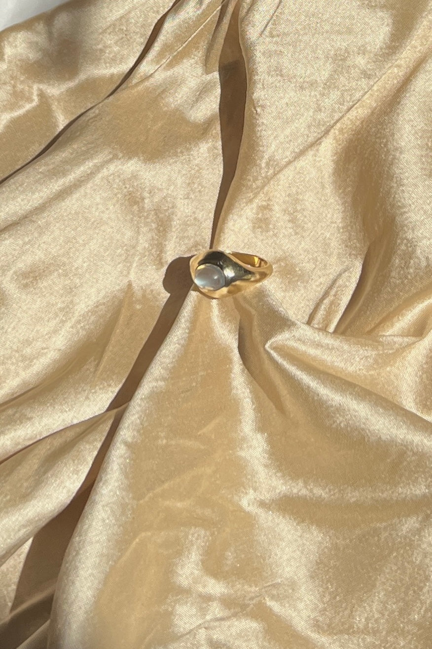 14k yellow gold ring set with moonstone cabochon