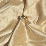 14k yellow gold ring set with moonstone cabochon