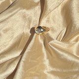 14k yellow gold ring set with moonstone cabochon