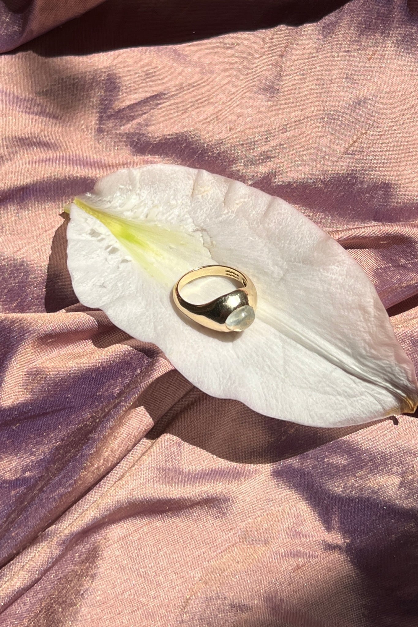 14k yellow gold ring set with moonstone cabochon
