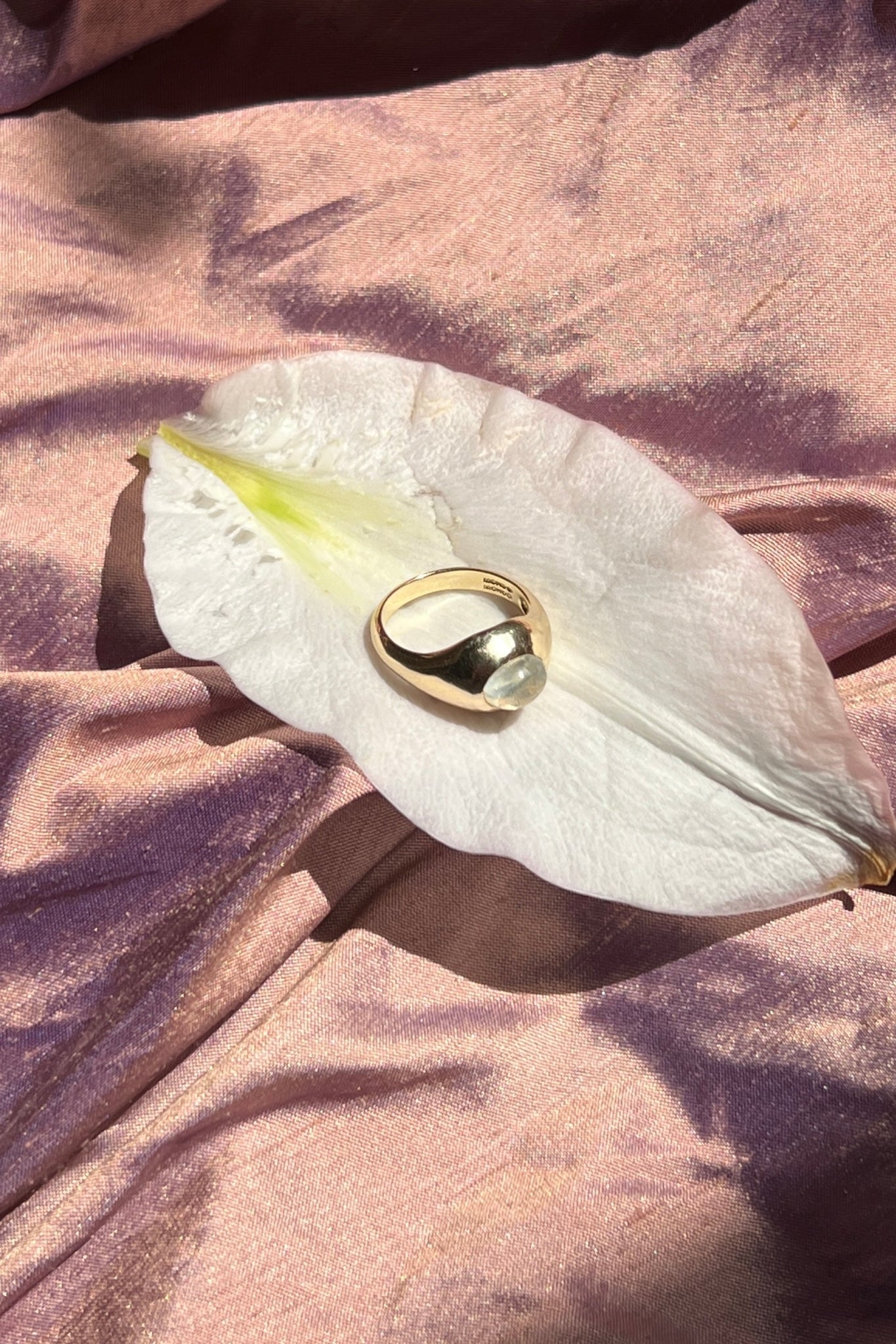 14k yellow gold ring set with moonstone cabochon