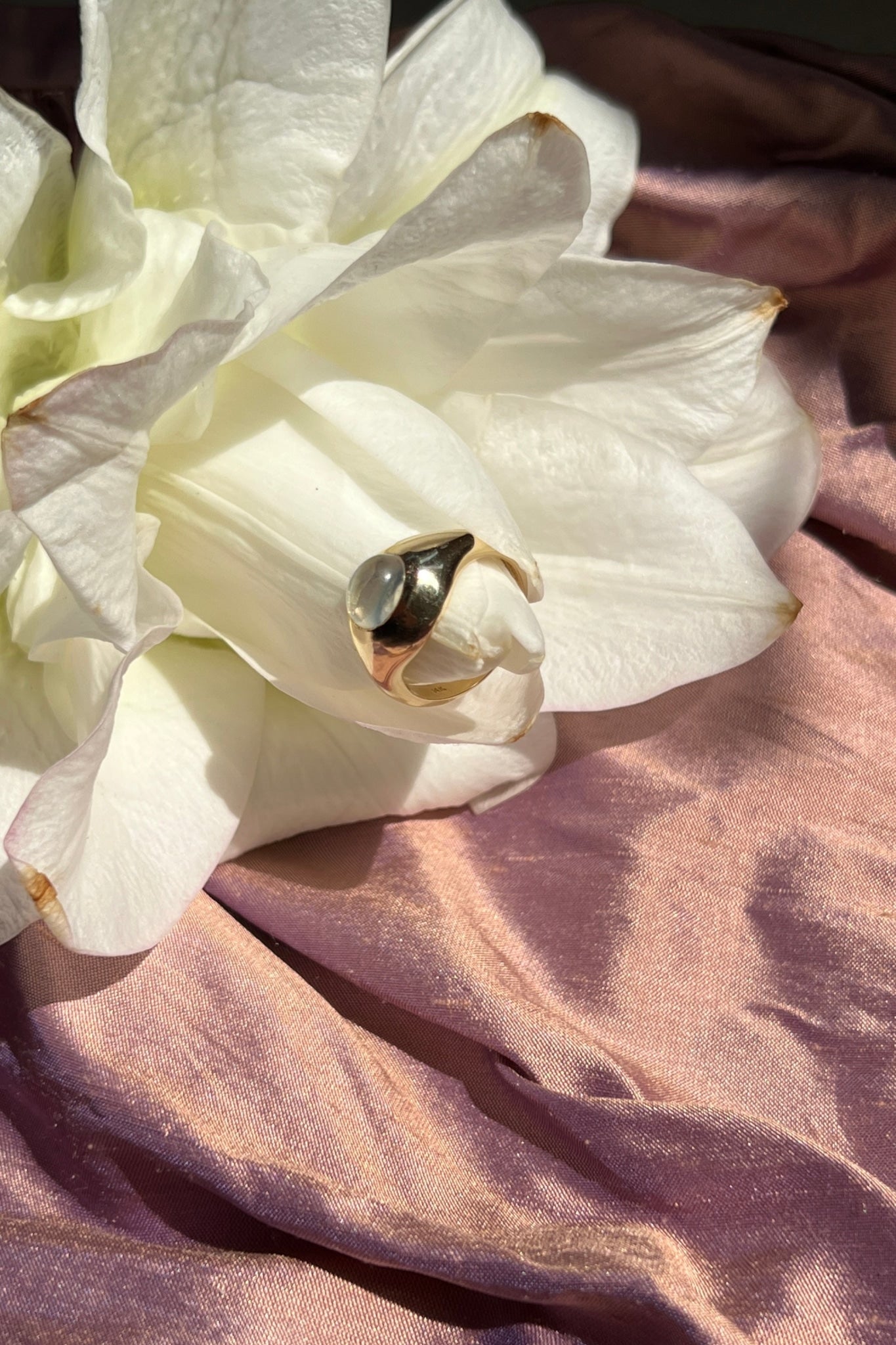 14k yellow gold ring set with moonstone cabochon