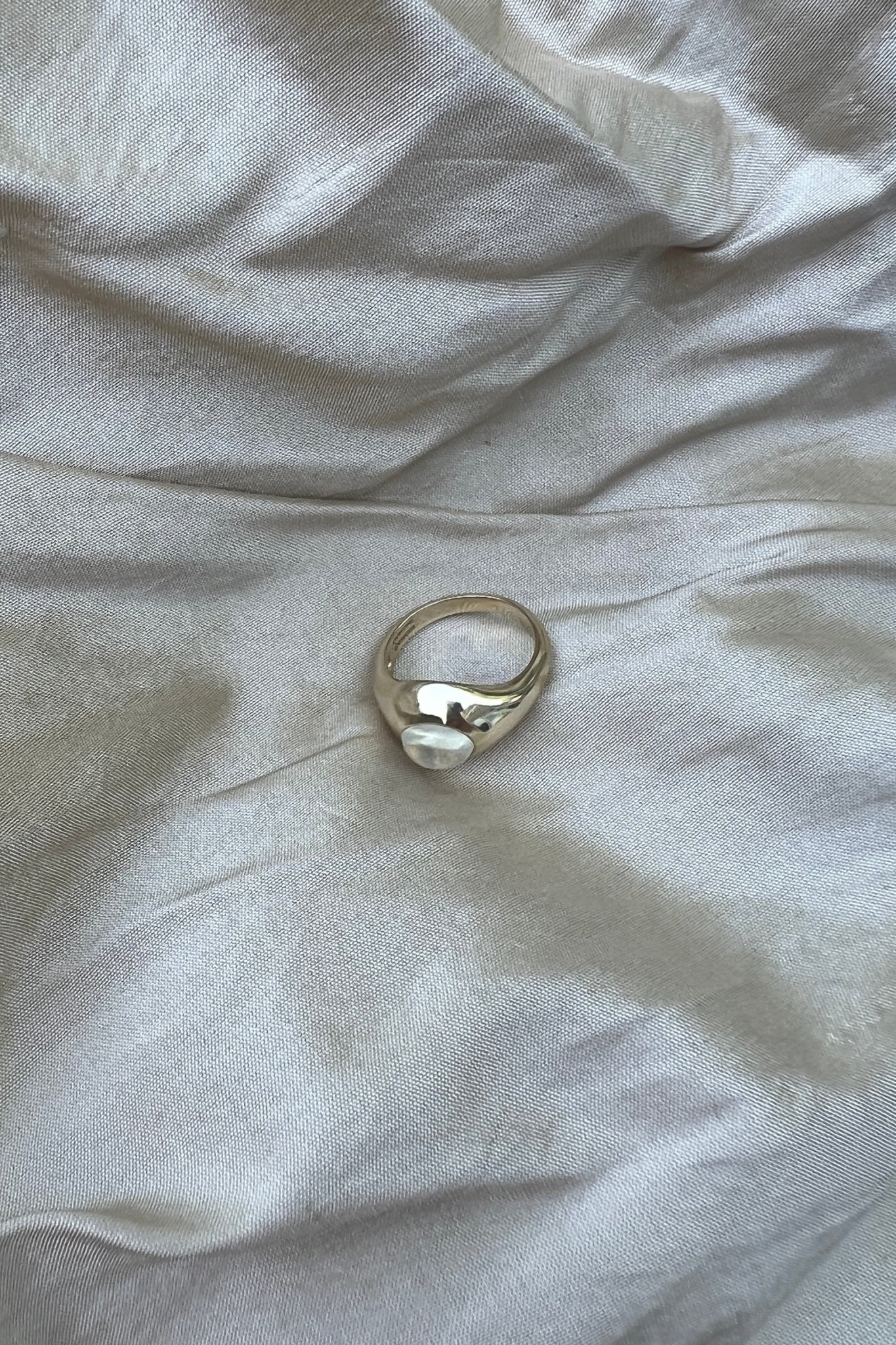 14k yellow gold ring set with moonstone cabochon