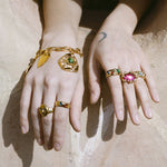 textured brass band ring with glass cabochons