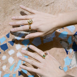 textured brass band ring with glass cabochons